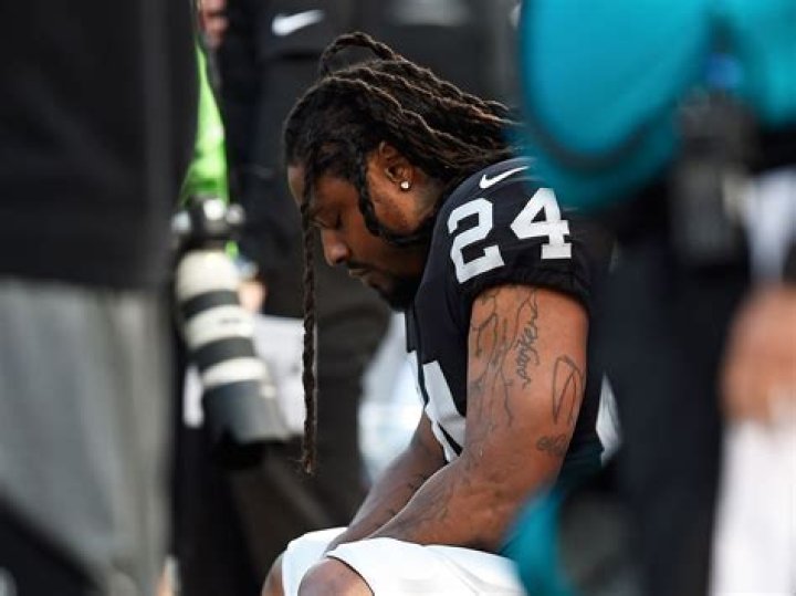 Marshawn Lynch: dating, net worth, tattoos, smoking & body facts